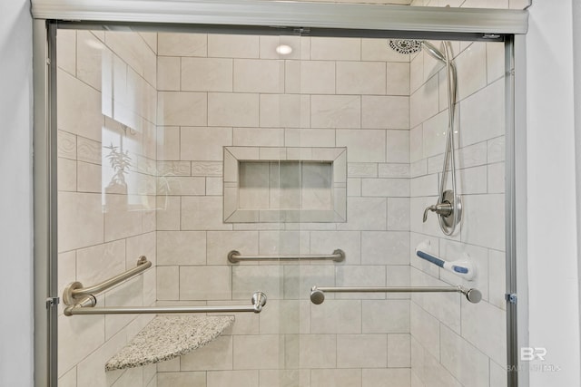 bathroom featuring a stall shower