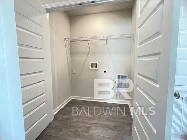 clothes washing area featuring dark hardwood / wood-style floors, hookup for a washing machine, and hookup for an electric dryer