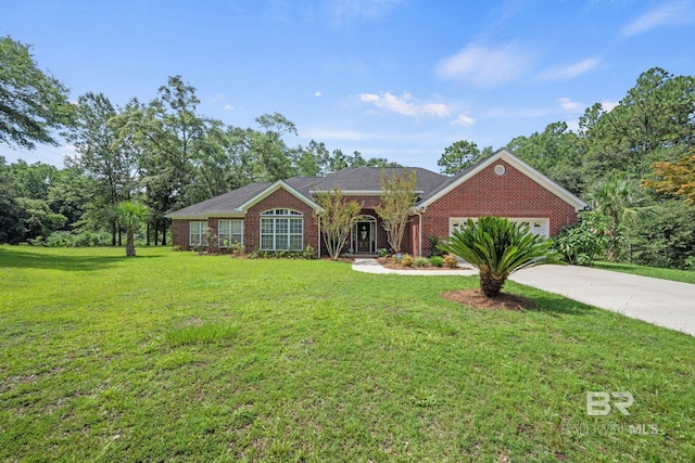 ranch-style home with a garage and a front yard