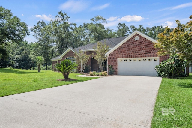 ranch-style house featuring a garage and a front yard