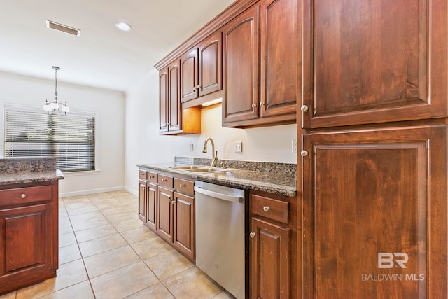 kitchen featuring stainless steel dishwasher, dark stone counters, sink, pendant lighting, and a chandelier