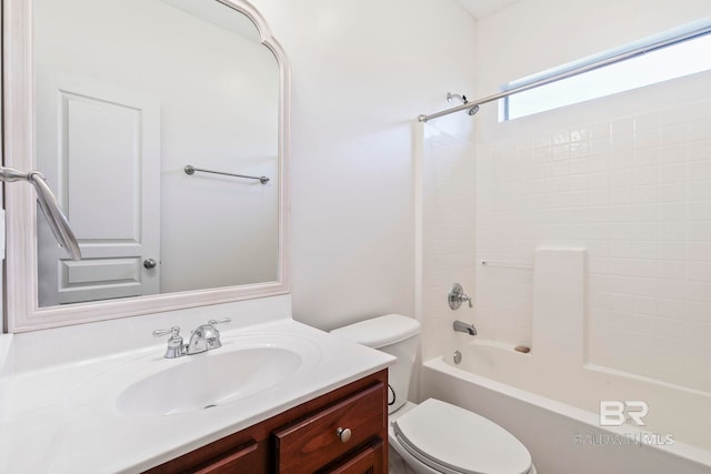 full bathroom featuring bathing tub / shower combination, vanity, and toilet