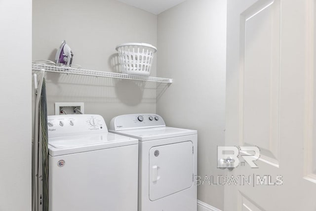 455 E Beach Blvd Unit 1505, Gulf Shores, AL 36542 - laundry area with separate washer and dryer and laundry area