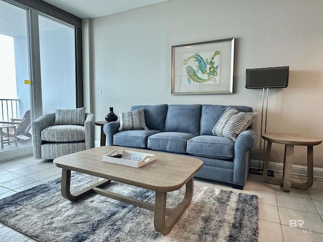 455 E Beach Blvd Unit 1505, Gulf Shores, AL 36542 - living area with baseboards and tile patterned flooring
