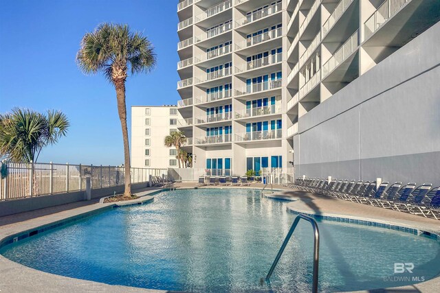 455 E Beach Blvd Unit 1505, Gulf Shores, AL 36542 - community pool featuring fence