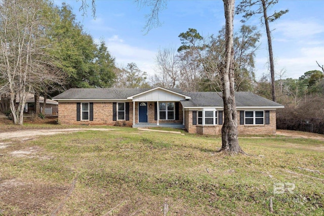 ranch-style home with a front yard