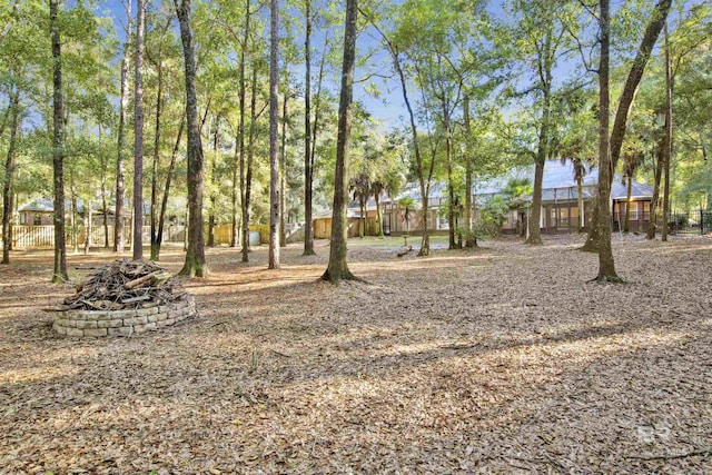 view of yard featuring a fire pit