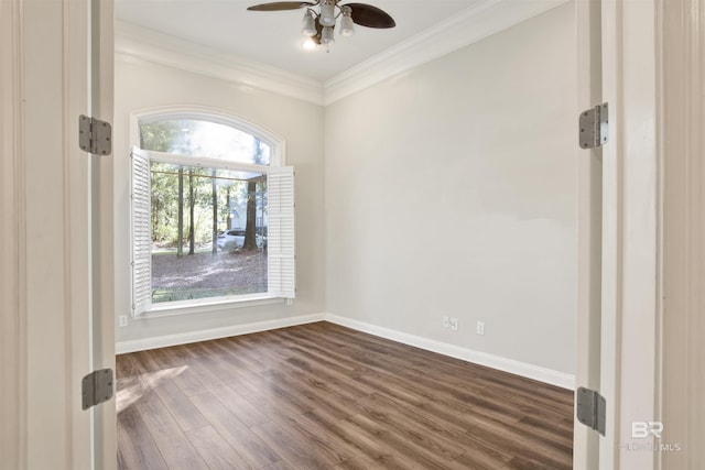 unfurnished room with ceiling fan, crown molding, and dark hardwood / wood-style floors