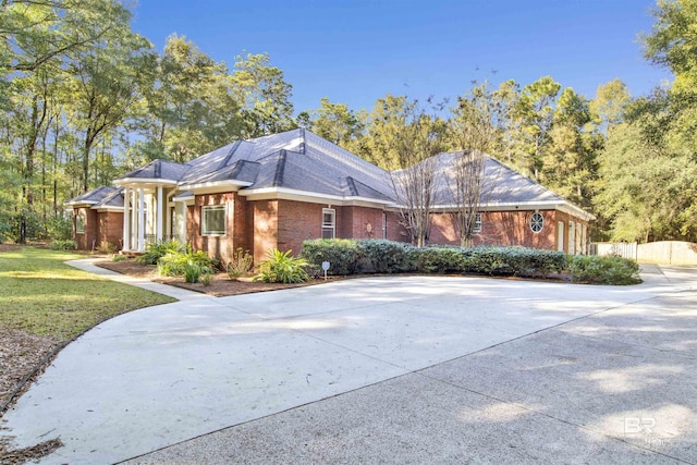 view of home's exterior featuring a lawn