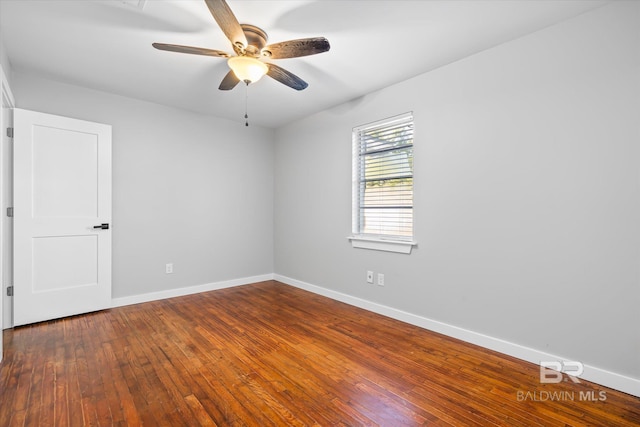 empty room featuring ceiling fan and wood-type flooring