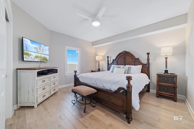 bedroom with ceiling fan and light hardwood / wood-style flooring