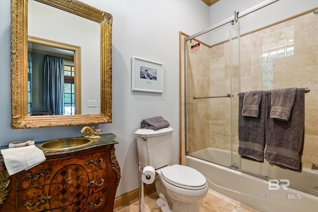 full bathroom with tile patterned flooring, vanity, shower / bath combination with glass door, and toilet