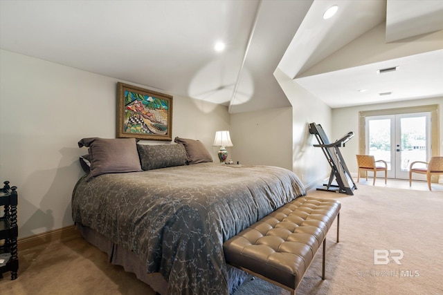 bedroom with french doors, vaulted ceiling, and light colored carpet