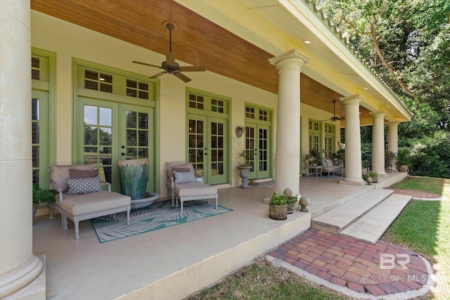 view of patio featuring ceiling fan and french doors