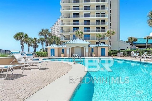 view of pool with a patio area