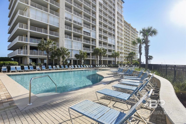 view of swimming pool featuring a patio