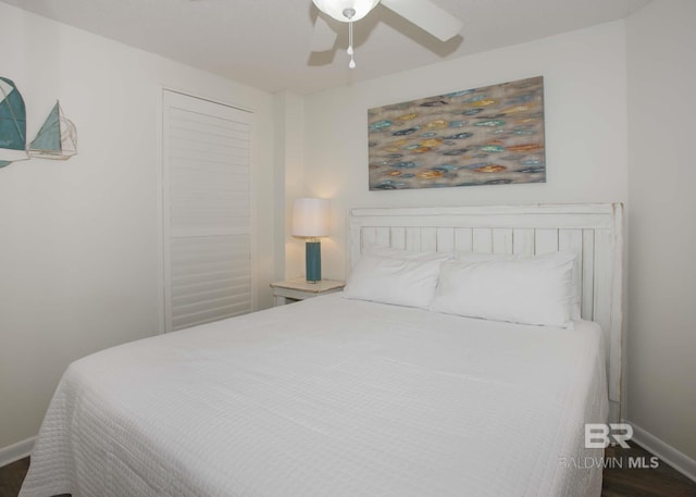 bedroom featuring wood-type flooring and ceiling fan