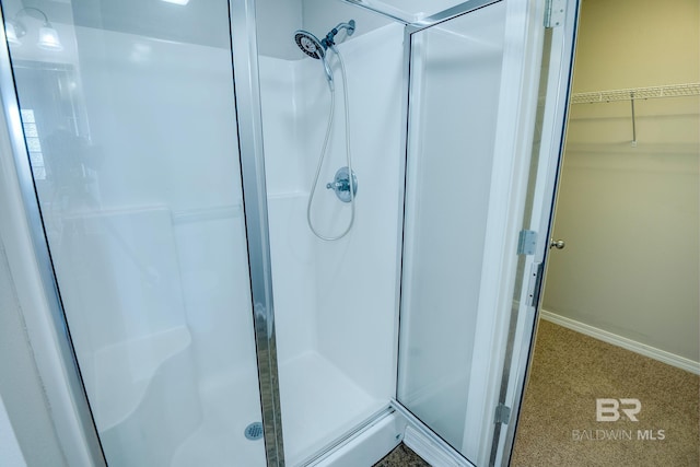 bathroom with an enclosed shower