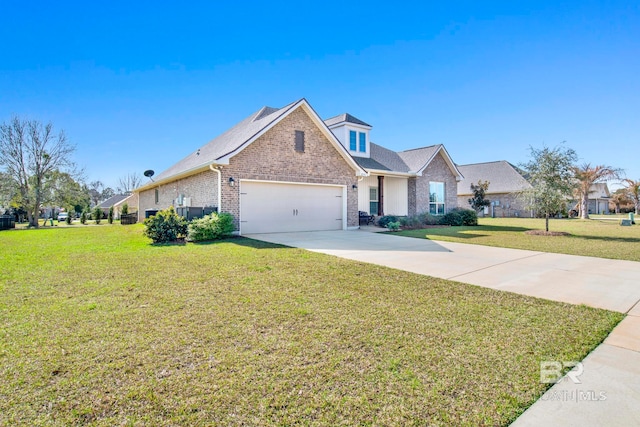 view of front of property featuring a garage and a front lawn