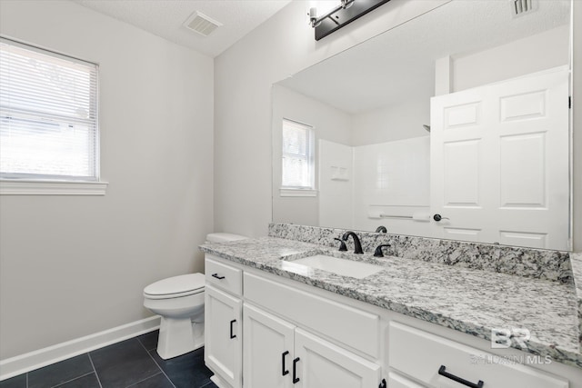 full bathroom featuring tile patterned floors, visible vents, baseboards, and toilet