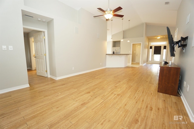 unfurnished living room featuring ceiling fan, high vaulted ceiling, and light hardwood / wood-style floors