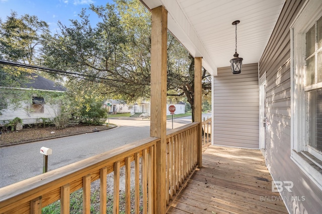 401 Gaston St, Mobile, AL 36603 - wooden deck with covered porch