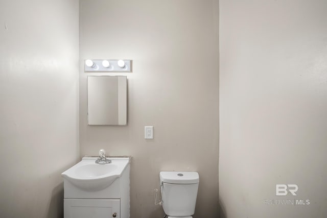 401 Gaston St, Mobile, AL 36603 - half bathroom featuring toilet and vanity