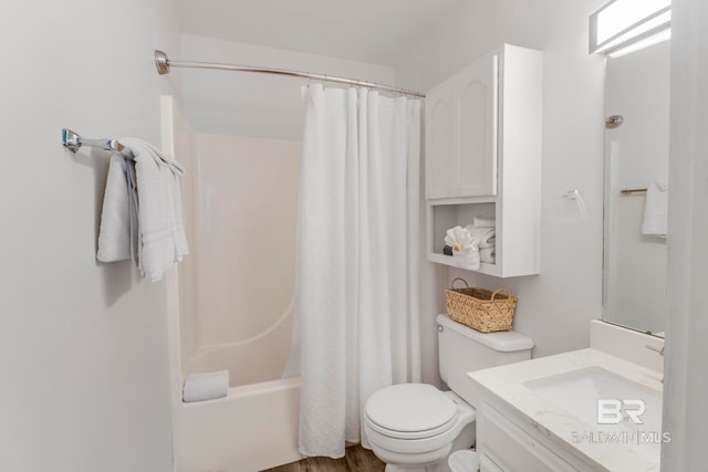 full bathroom featuring vanity, toilet, and shower / bath combo with shower curtain