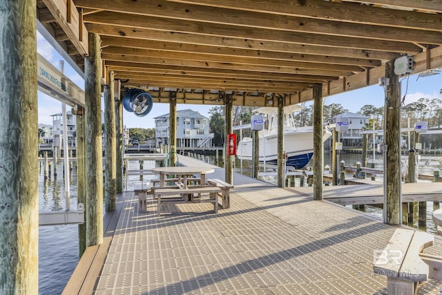 view of dock with a water view