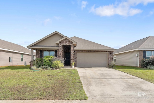 view of front of property with a front yard and a garage