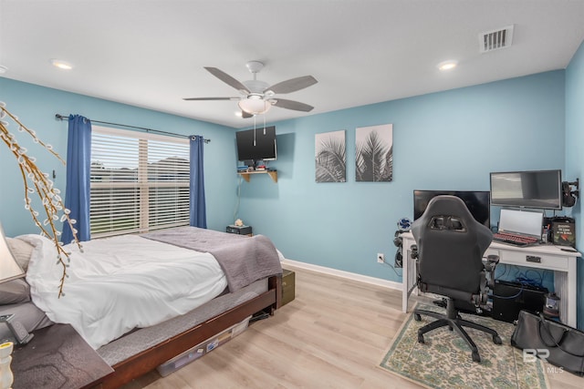 bedroom featuring ceiling fan and light hardwood / wood-style floors