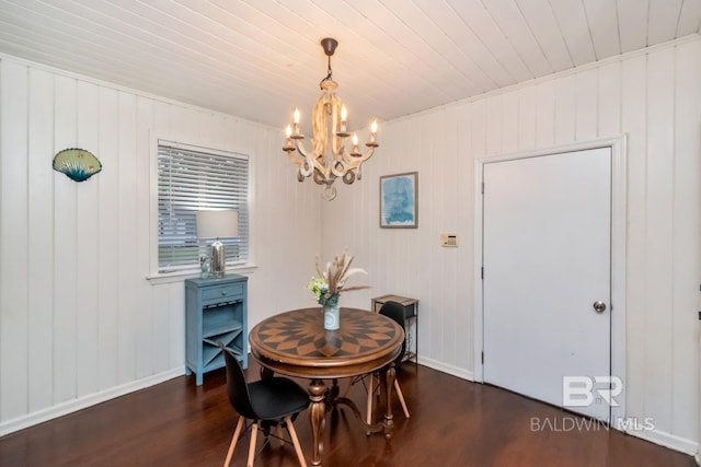 1 Elizabeth Pl, Mobile, AL 36606 - dining area featuring dark wood-style flooring, a chandelier, wood ceiling, and baseboards
