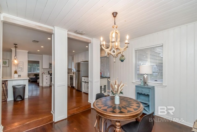 1 Elizabeth Pl, Mobile, AL 36606 - dining room featuring dark wood finished floors, a chandelier, ornamental molding, and wood ceiling