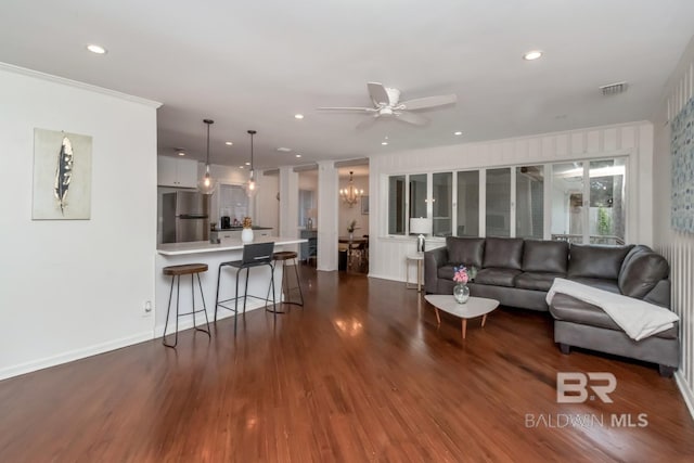 1 Elizabeth Pl, Mobile, AL 36606 - living area with a ceiling fan, dark wood-style flooring, a chandelier, recessed lighting, and baseboards