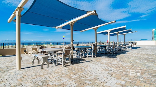 view of patio / terrace featuring a water view