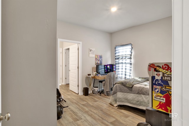 bedroom with light wood-type flooring