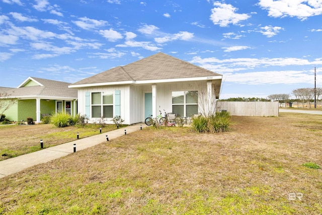 view of front of property with a front lawn