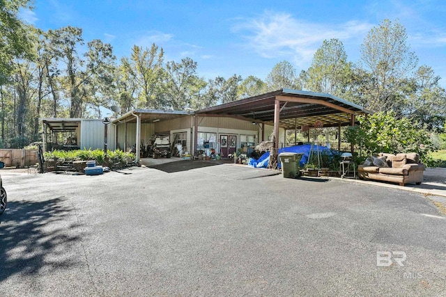 view of car parking with a carport