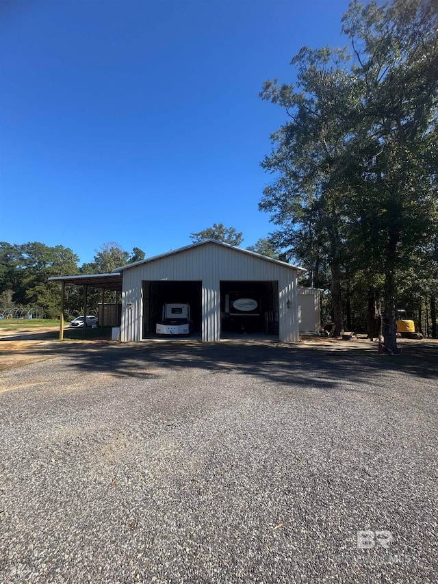 garage with a carport