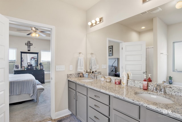 bathroom featuring vanity and ceiling fan