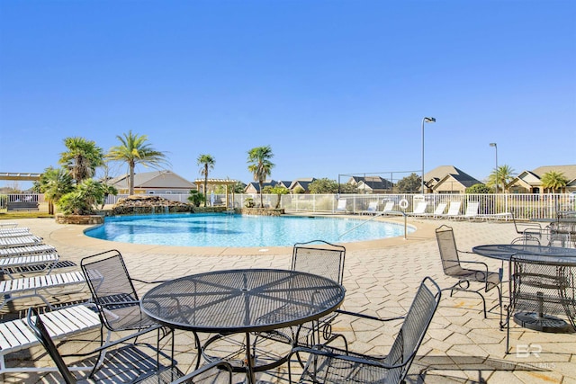 view of swimming pool featuring a patio