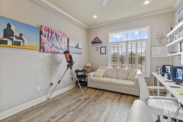 home office with hardwood / wood-style flooring and crown molding