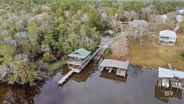 drone / aerial view with a water view