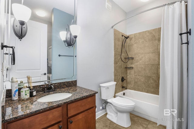 bathroom with vanity, baseboards, shower / bath combo with shower curtain, tile patterned floors, and toilet