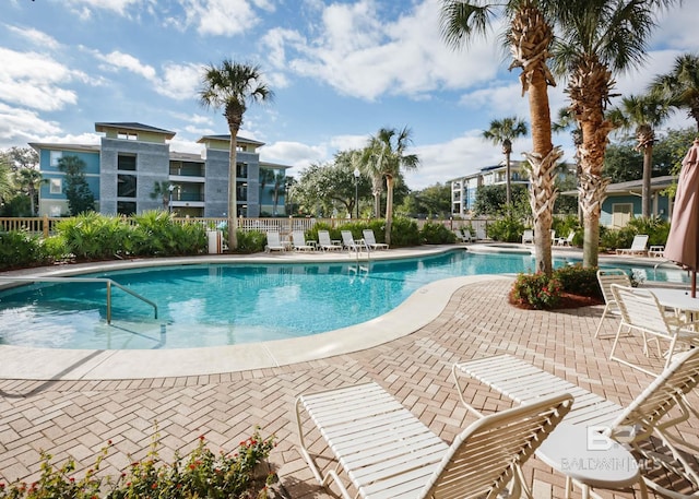 view of pool featuring a patio