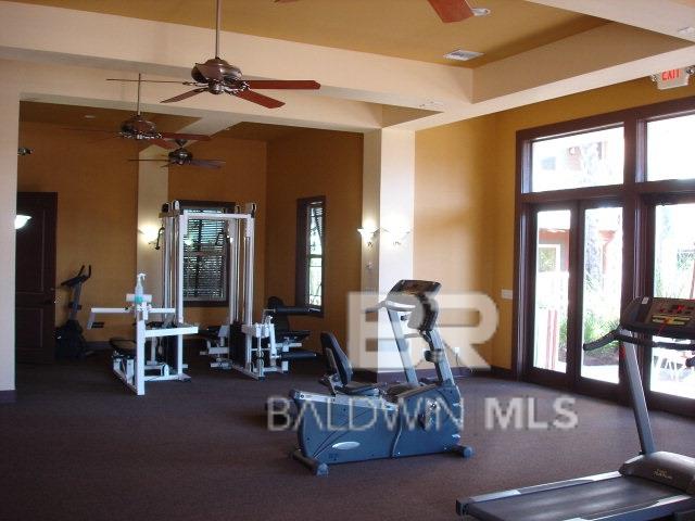 workout area with ceiling fan