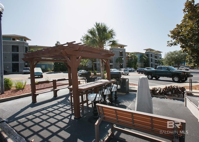 view of home's community with a pergola