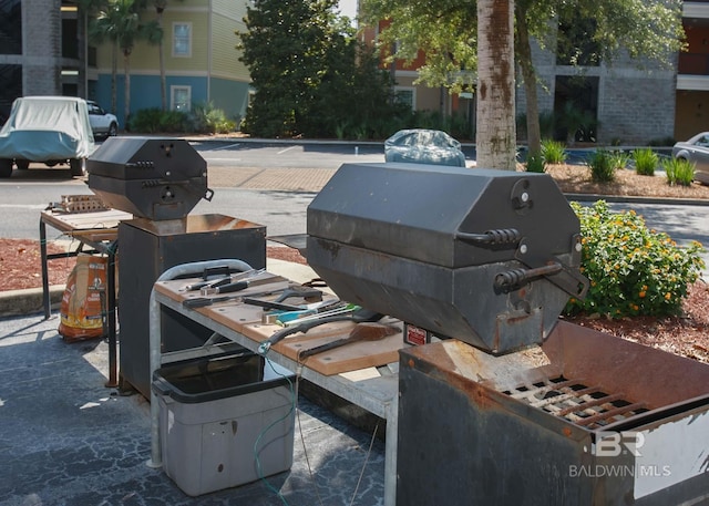 view of patio featuring a grill