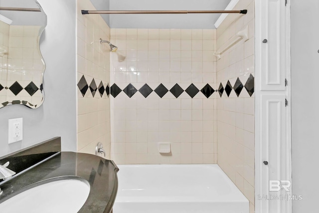 full bath featuring a sink and bathtub / shower combination