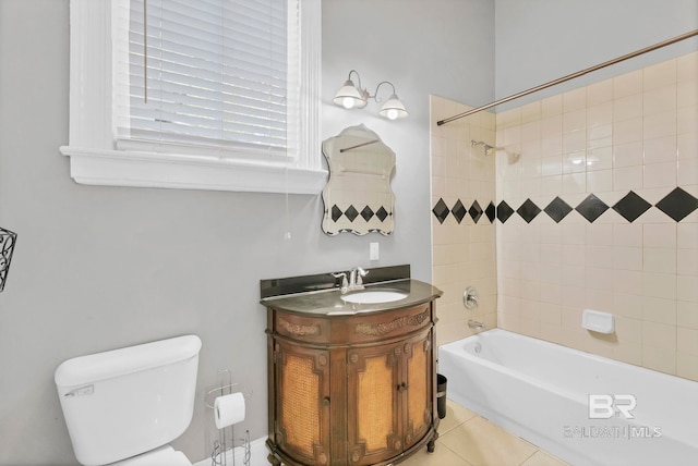 bathroom featuring washtub / shower combination, tile patterned flooring, vanity, and toilet